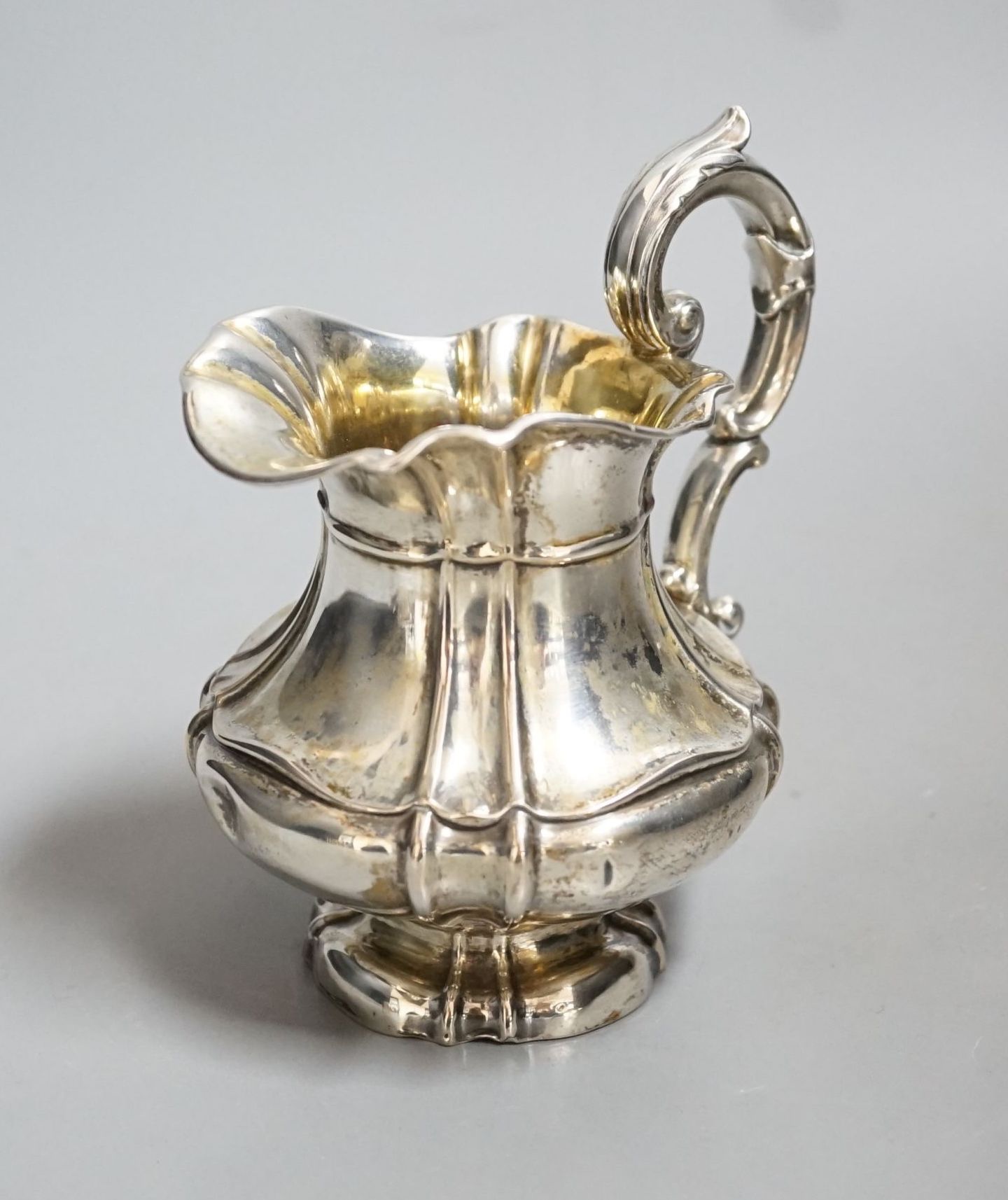 A continental white metal cream jug, 14cm, 5.5oz.